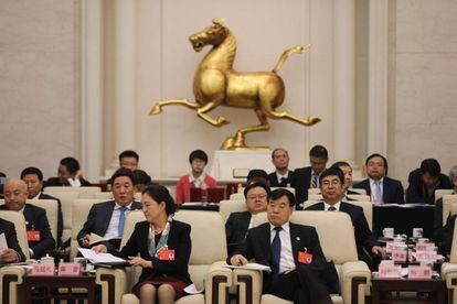 Delegados asisten al XIX Congreso del Partido Comunista de China en el Gran Palacio del Pueblo en Pekín (China), el 19 de octubre de 2017.