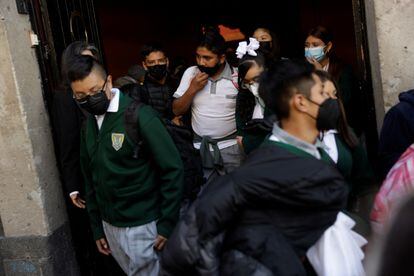 Students leave school after returning from face-to-face classes on January 3 in Mexico City.