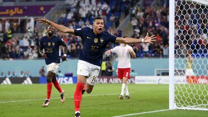 DOHA, QATAR - NOVEMBER 26: Kylian Mbappe of France celebrates after scoring their team's second goal during the FIFA World Cup Qatar 2022 Group D match between France and Denmark at Stadium 974 on November 26, 2022 in Doha, Qatar. (Photo by Stu Forster/Getty Images)