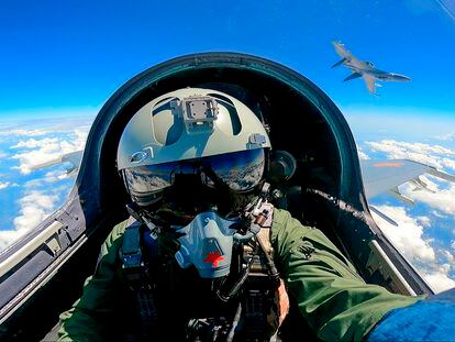 In this photo released by Xinhua News Agency, a Chinese fighter jet pilot from the Eastern Theater Command of the Chinese People's Liberation Army (PLA) takes part in combat readiness patrol and military exercises around the Taiwan Island on Sunday, April 9, 2023. China's military declared Monday it is "ready to fight" after completing three days of large-scale combat exercises around Taiwan that simulated sealing off the island in response to the Taiwanese president's trip to the U.S. last week. (Mei Shaoquan/Xinhua via AP)