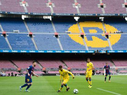 Los azulgrana derrotan a la Unión Deportiva Las Palmas con un gol de Busquets y dos de Messi en un partido inanimado que puso a Bartomeu en la diana