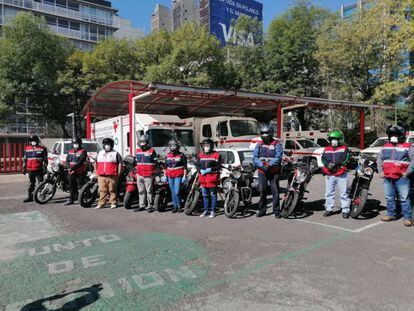 Voluntarios de la Cruz Roja Mexicana del programa “Voluntarios sobre ruedas”, en su labor de lucha contra la pandemia