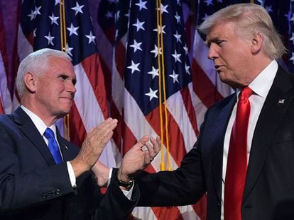 Donald Trump (derecha) y Mike Pence.