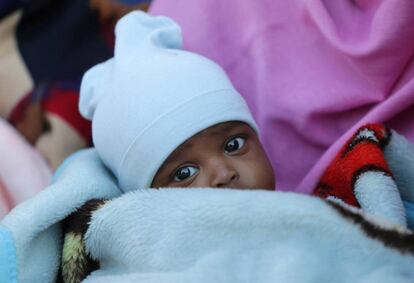 Un niño migrante en uno centro de detención en Bengasi (Libia), el pasado 13 de diciembre.