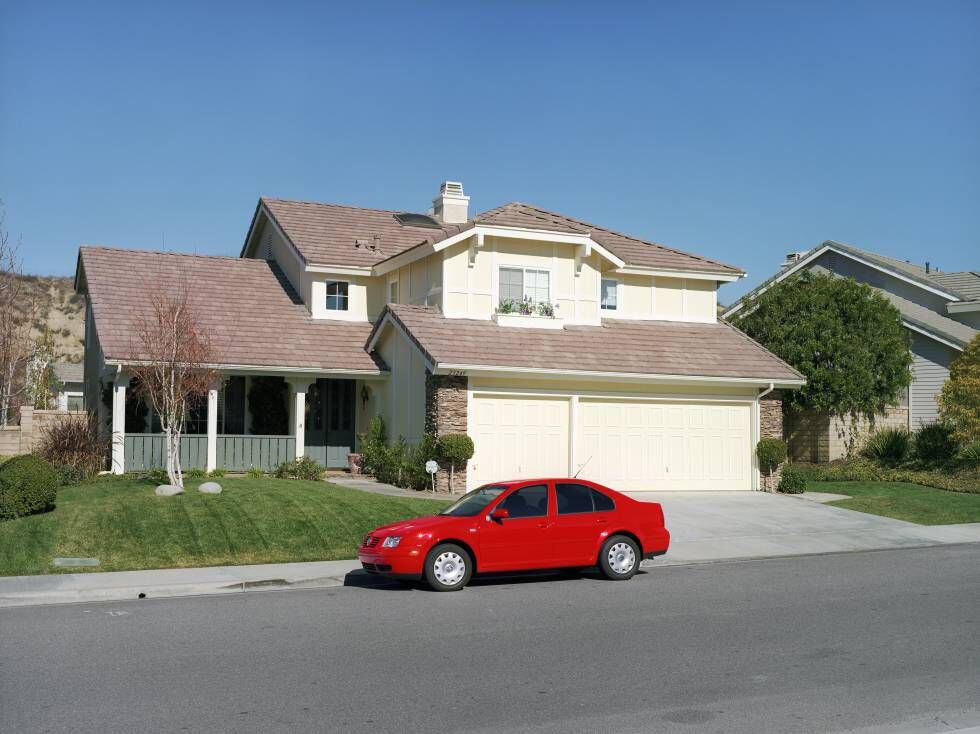 House with red Volkswagen, California, 2001