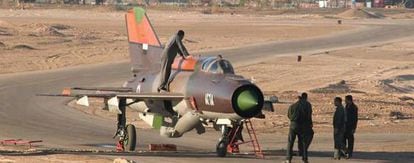 A handout picture obtained from Ammon News and supplied by Syrian activists shows the Syrian air force Russian-made MiG-21 plane that a pilot landed with in the King Hussein military base in Mafraq in northern Jordan on June 21, 2012. Jordan granted political asylum to the Syrian pilot, identified by Syrian authories as Colonel Hassan Merei al-Hamade, hours after he landed his jet in the base, in the first such defection in the 15-month Syrian revolt. AFP PHOTO/HO/AMMON NEWS == RESTRICTED TO EDITORIAL USE - MANDATORY CREDIT "AFP PHOTO / HO / AMMON NEWS " - NO MARKETING NO ADVERTISING CAMPAIGNS - DISTRIBUTED AS A SERVICE TO CLIENTS ==
