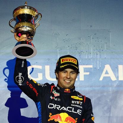 BAHRAIN, BAHRAIN - MARCH 02: Second placed Sergio Perez of Mexico and Oracle Red Bull Racing celebrates on the podium during the F1 Grand Prix of Bahrain at Bahrain International Circuit on March 02, 2024 in Bahrain, Bahrain. (Photo by Clive Rose/Getty Images)