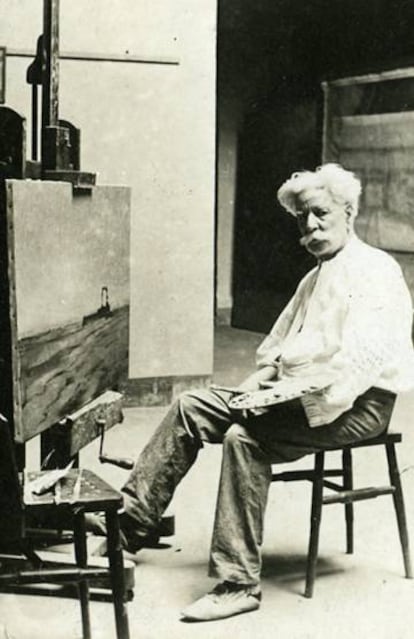 Modest Urgell pintant en el seu estudi (1903-1913).