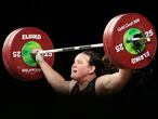 FILE - In this April 9, 2018 file photo, New Zealand's Laurel Hubbard lifts in the snatch of the women's +90kg weightlifting final at the 2018 Commonwealth Games on the Gold Coast, Australia. Hubbard will be the first transgender athlete to compete at the Olympics.Hubbard is among five athletes confirmed on New Zealand's weightlifting team for the Tokyo Games. (AP Photo/Mark Schiefelbein,File)