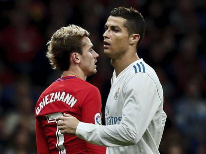 Griezmann y Cristiano, en el derbi.