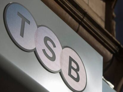 FILE PHOTO: A sign is displayed outside a branch of the TSB bank in central London