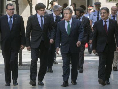 Jordi Jan&eacute;, Carles Puigdemont, Juan Ignacio Zoido i Enric Millo.