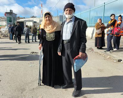 Haline Salam, 68, left, after being rejected with her husband at the Qalandia stall, this Friday.