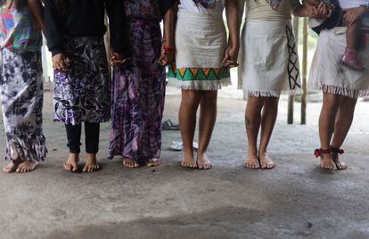 Indigenous women from the Guarani Mbya ethnic group sing and dance during celebrations for the Day of Indigenous Peoples in the town of Mata Verde Bonita, near Rio de Janeiro, on April 19, 2023.