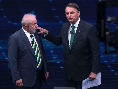 Los candidatos Lula da Silva y Jair Bolsonaro, durante el debate presidencial en São Paulo el domingo.