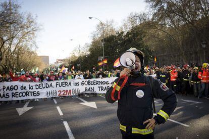 Pancarta de la cabecera de la manifestación, que discurre entre Atocha y Colón en Madrid.