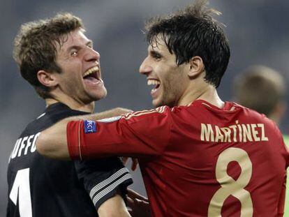 Müller y Javi Martínez, tras eliminar al Juventus.