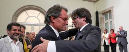 Los expresidentes de la Generalitat Artur Mas y Carles Puigdemont, en una foto tomada cuando este último era aún presidente.