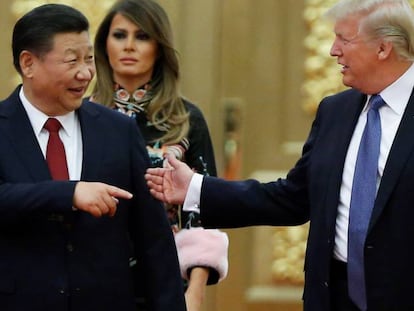 Donald Trump y Melania en una cena con el presidente chino, Xi Jinping, en 2017.