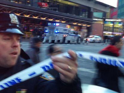Police respond to a report of an explosion near Times Square on Monday, Dec. 11, 2017, in New York. (AP Photo/Charles Zoeller)