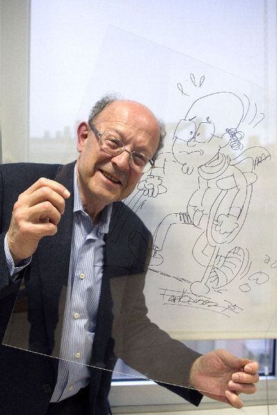 Ibáñez, ayer, con una caricatura de sí mismo anciano.