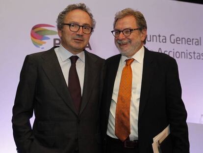 Juan Luis Cebrián y Manuel Polanco, en la junta extraordinaria de accionistas de Prisa.