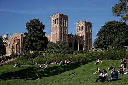 Students sit on the lawn near Royce Hall at UCLA in the Westwood section of Los Angeles