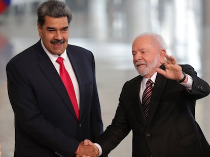 Brazilian President Luiz Inácio Lula da Silva, right, shakes hands with Venezuela's President Nicolás Maduro prior to their bilateral meeting at Planalto palace in Brasília, Brazil, on May 29, 2023.