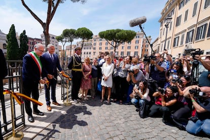 Rome's Mayor Roberto Gualtieri, left, and Bulgari CEO Jean-Christophe Babin cut the ribbon to inaugurate the walkways and nighttime illumination of the so called 'Sacred Area' where four temples, dating back as far as the 3rd century B.C., stand smack in the middle of one of modern Rome's busiest crossroads, Monday, June 19, 2023.