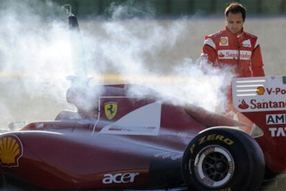 Massa salta del Ferrari mientras arde la parte trasera de su monoplaza.