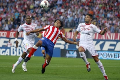 Falcao vies for the ball with the Sporting defense on Wednesday.