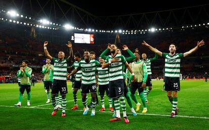 Sporting CP's Arthur Gomes, Jeremiah St. Juste, Dario Essugo and Goncalo Inacio celebrate after winning the penalty shootout.