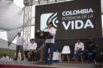President Gustavo Petro speaks to the local community during a land handover ceremony in Buenos Aires, Colombia; December 13, 2023.