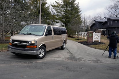 A vehicle leaves the neighborhood after the FBI concluded a search at Vice President Mike Pence's Indiana home, Friday, Feb. 10, 2023 in Carmel, Ind.