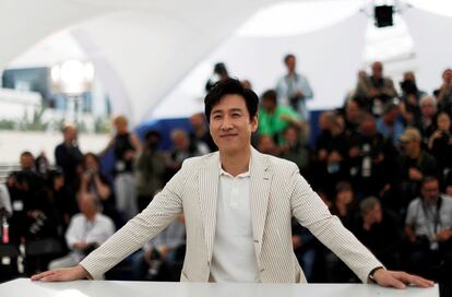 Lee Sun-Kyun poses for photographers at the Cannes film festival in May 2019.