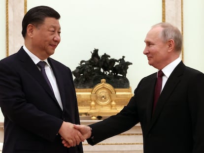 Russian President Vladimir Putin meets with China's President Xi Jinping at the Kremlin in Moscow on March 20, 2023. (Photo by Sergei KARPUKHIN / SPUTNIK / AFP)