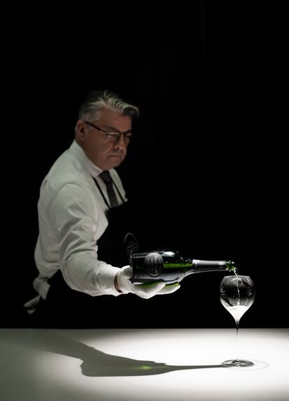 Guillaume Philippe, the maison’s sommelier, serves a glass of Grand Siècle.