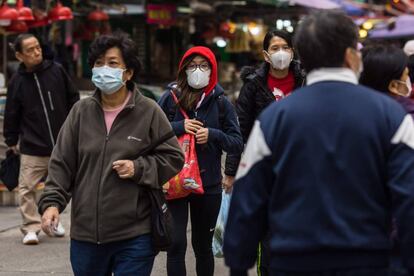 Ciudadanos con máscaras por el coronavirus.