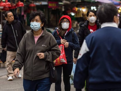 Ciudadanos con máscaras por el coronavirus.