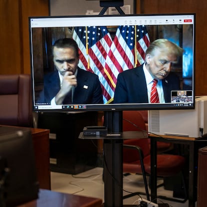 Todd Blanche, attorney for former US President Donald Trump, and US President-elect Donald Trump are seen on the screen at Manhattan criminal court in New York, US, on Friday, Jan. 10, 2025.     Jabin Botsford/Pool via REUTERS