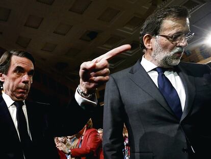 José María Aznar y Mariano Rajoy en la Convención Nacional del Partido Popular.
