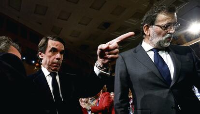 José María Aznar y Mariano Rajoy en la Convención Nacional del Partido Popular.