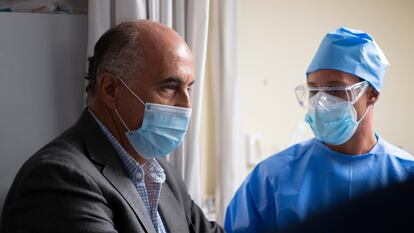 The deputy health chief in Madrid Antonio Zapatero (l) visits a PCR testing center in Alcobendas, Madrid on Friday.