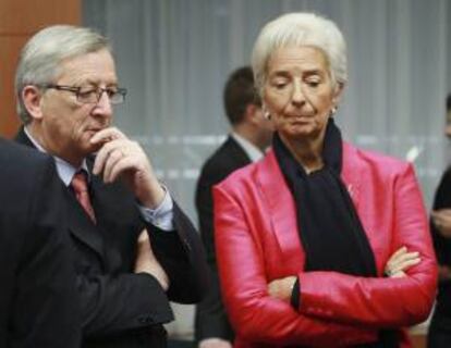 El presidente del Eurogrupo, Jean-Claude Juncker (i), y la Directora Gerente del Fondo Monetario Internacional (FMI), Christine Lagarde. EFE/Archivo