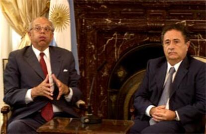 Batlle y Duhalde en la reunión que han mantenido en la residencia presidencial en Buenos Aires.