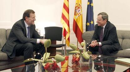 El presidente del Gobierno, Mariano Rajoy, con el presidente del Banco Central Europeo (BCE), Mario Draghi.