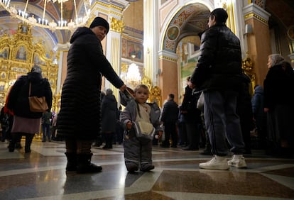 Believers attend the Orthodox Christmas Eve service at a cathedral in the course of Russia-Ukraine conflict in Donetsk, Russian-controlled Ukraine, on January 6, 2024.