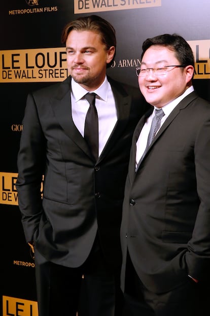 Leonardo DiCaprio junto a Jho Low, en el estreno de 'El lobo de Wall Street' en París, el 9 de diciembre de 2013.