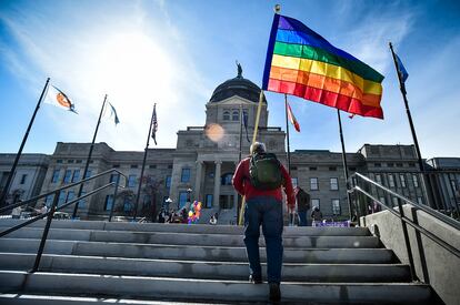 Demonstrators gather on the steps of the Montana state Capitol protesting anti-LGBTQ+ legislation in Helena, Mont