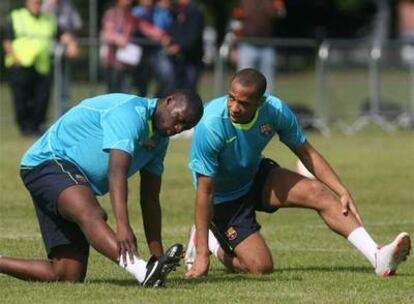 Touré y Henry, en un momento del entrenamiento de ayer.